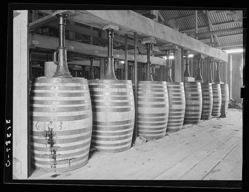 Untitled photo, possibly related to: Barrels of perique tobacco during process of aging. Perique tobacco is raised in one parish in Louisiana, and this is the only place in the world where this tobacco is raised. Saint James Parish, Louisiana