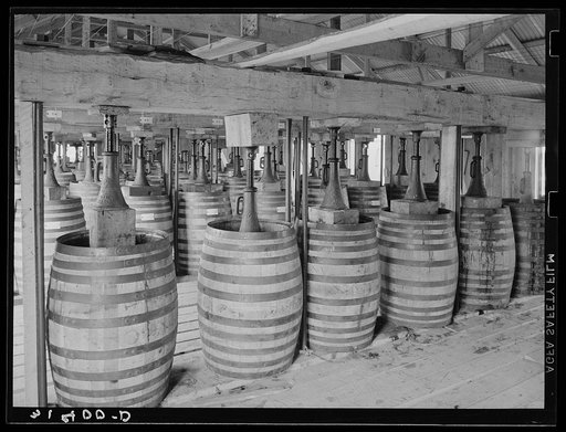 Untitled photo, possibly related to: Barrels of perique tobacco during process of aging. Perique tobacco is raised in one parish in Louisiana, and this is the only place in the world where this tobacco is raised. Saint James Parish, Louisiana