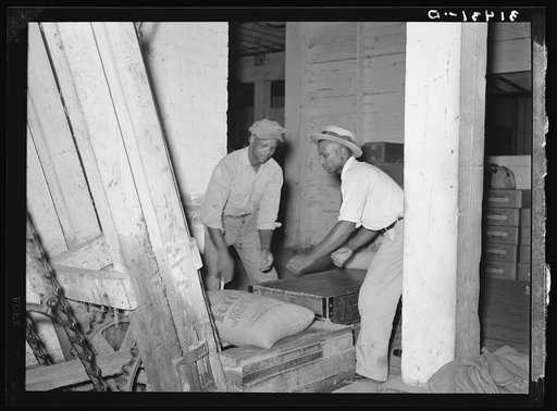 Elevating rice to second floor by means of conveyors. Rice mill, Abbeville, Louisiana