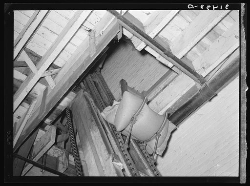 Rice being elevated to second floor by means of conveyers. Rice mill, Abbeville, Louisiana