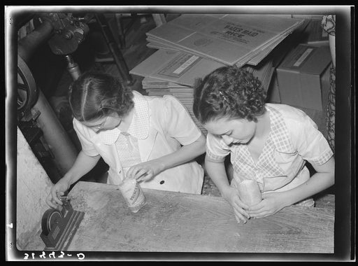 Putting rice in cellophane packages. Abbeville, Louisana