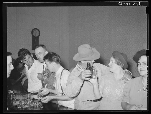 People in advanced stage of inebriation in saloon during National Rice Festival. Crowley, Louisiana