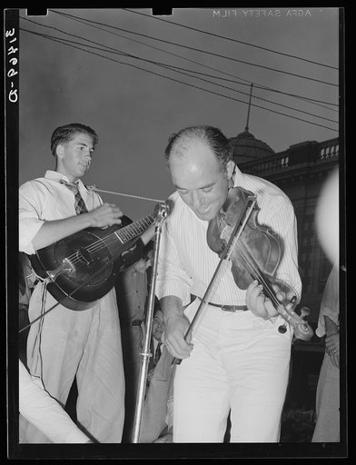 Musicians in Cajun band contest, National Rice Festival, Crowley, Louisiana. Most of the music was of the folk variety accompanied by singing