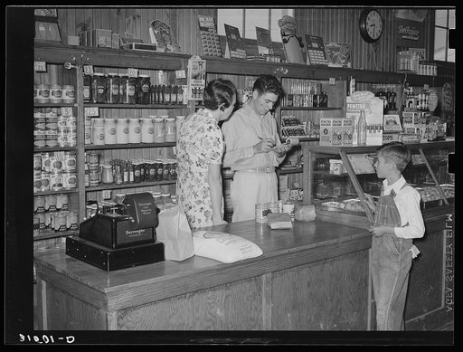 Making a sale, Lake Dick cooperative store. Lake Dick Project, Arkansas