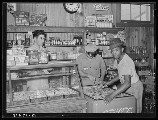 Icing soft drink refrigerator in general store. Lake Dick Project, Arkansas