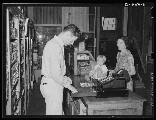 Making change. Cooperative store. Lake Dick Project, Arkansas