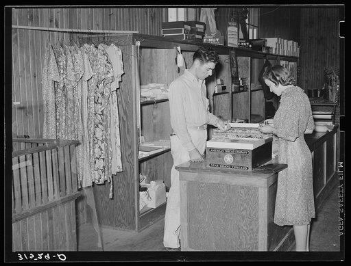 Dress and dry goods counter. Cooperative general store. Lake Dick Project, Arkansas