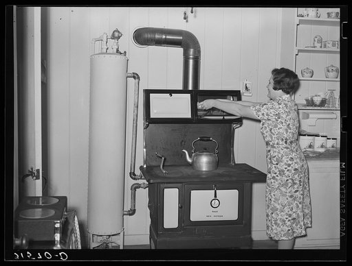 Stove and hot water boiler in farm home. Lake Dick Project, Arkansas