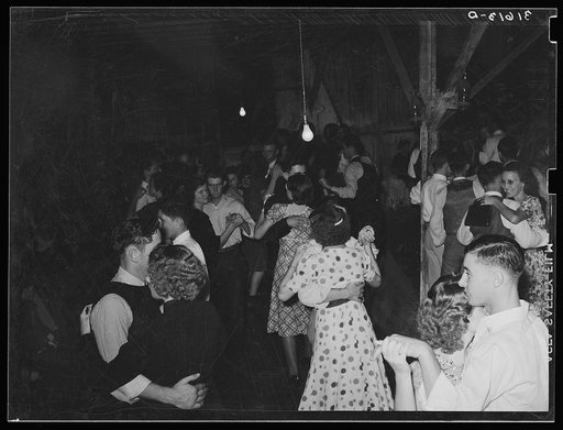 Untitled photo, possibly related to: Fais-do-do near Crowley, Louisiana. These are gatherings of local country people usually of French origin who are clannish. Very few outsiders are present at these dances. Sections of the hall are reserved for the different sexes. They are usually attended by fam