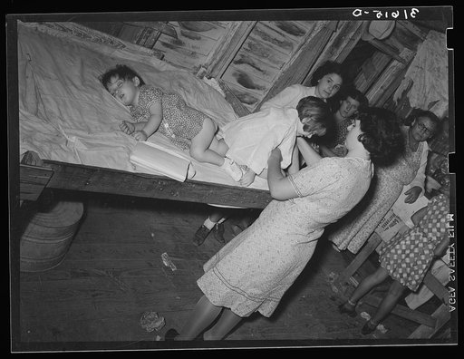 Corner of dance hall reserved for checking children while parents dance fais-do-do dance. Crowley, Louisiana