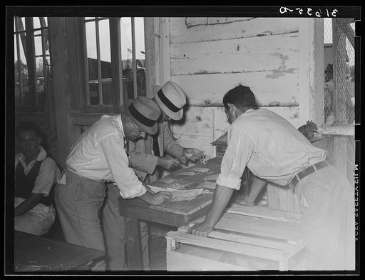 Tagging exhibits at South Louisiana State Fair. Donaldsonville, Louisiana