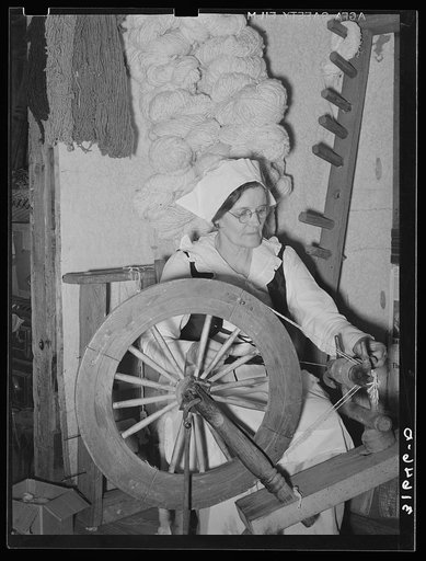 Madame Dronet twisting two strands of thread into one. Erath, Louisiana