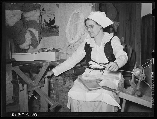 Madame Dronet making hanks of thread. Erath, Louisiana