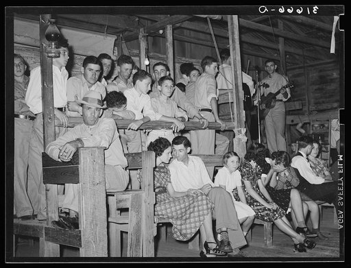Men's section at fais-do-do near Crowley, Louisiana. Note ticket taker