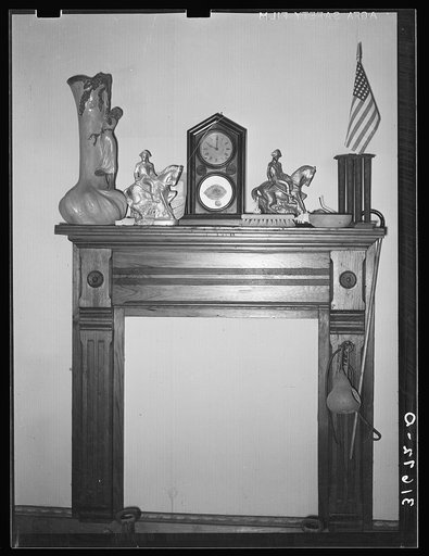 Mantle and fireplace in home of Madame Dronet. Erath, Louisiana
