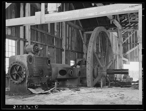 Old engine in abandoned sugar mill near Gibson, Louisana