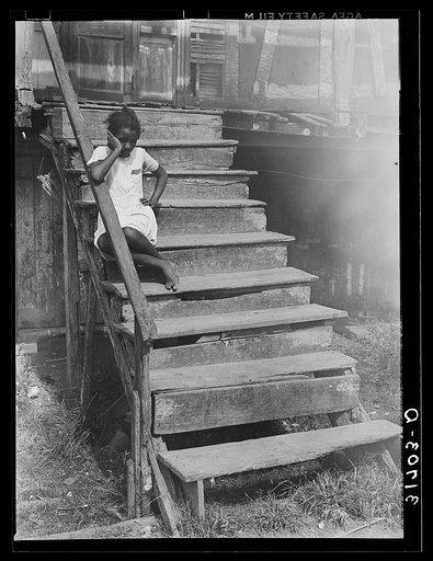 Untitled photo, possibly related to: Negro child residing in old Trepagnier house near Norco, Louisiana