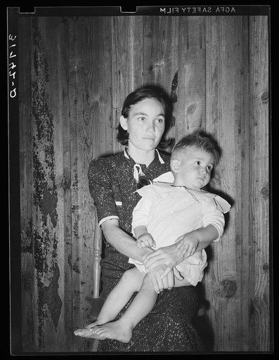 Daughter-in-law and grandson of W.E. Smith. Near Morganza, Louisiana