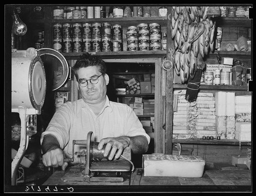 Owner of general store slicing baloney. Jarreau, Louisiana