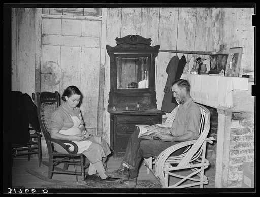 Mr. and Mrs. M. LaBlanc in living room of farm home. Morganza, Louisiana. He will participate in tenant purchase program