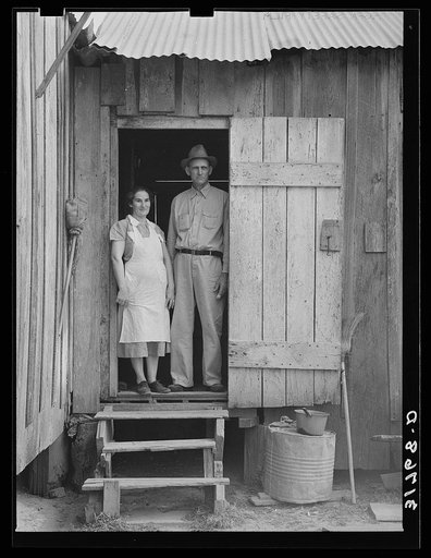 Mr. and Mrs. Emil Kimball standing in doorway of farm home. They will participate in tenant purchase program. Morganza, Louisiana