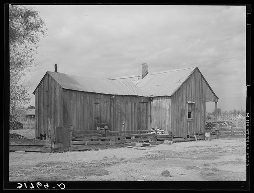 Home of Emil Kimball who will participate in tenant purchase program. Note lack of windows and crude fencing. Morganza, Louisiana