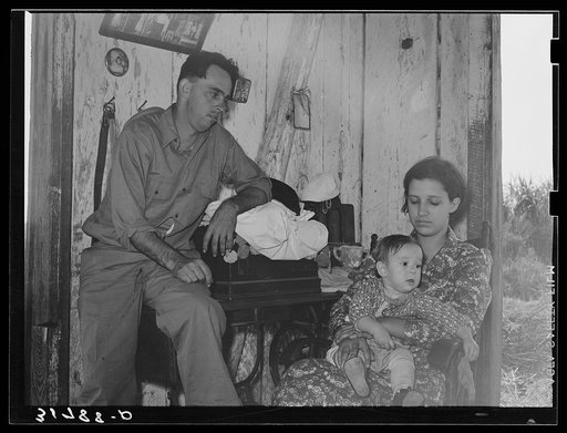 Untitled photo, possibly related to: Cajun day laborer, wife and child living near New Iberia, Louisiana