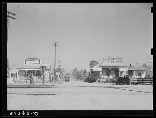Untitled photo, possibly related to: Looking across the railroad tracks into the Negro section of town. New Roads, Louisiana