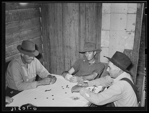 Poker game in home of day laborer, Sunday afternoon. Near New Iberia, Louisiana