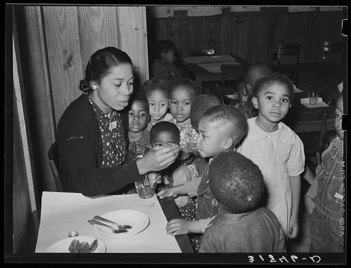 Untitled photo, possibly related to: Children in nursery school getting cod liver oil. Lakeview Project, Arkansas