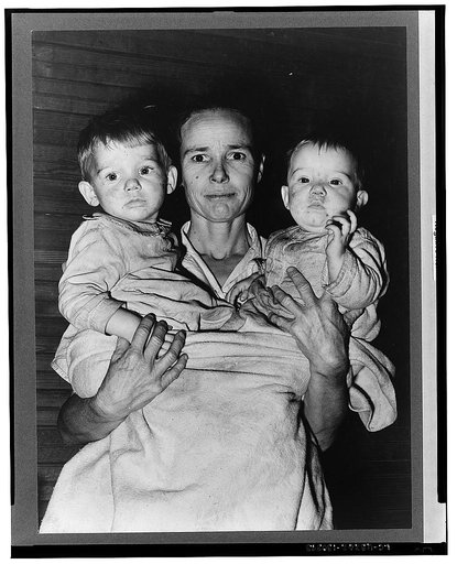 Mrs. Scarbrough with two youngest children. Laurel, Mississippi