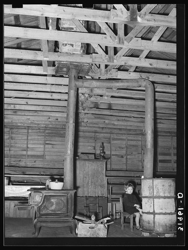 Stoves in former country church now used as residence. Near Laurel, Mississippi