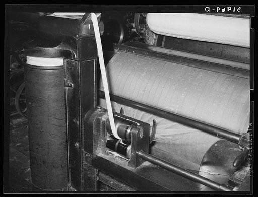 Detail of process of making cotton ropes from cotton bats. Laurel mills, Mississippi