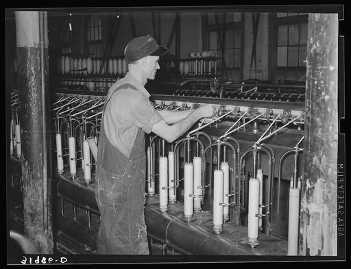Converting cotton ropes into rough thread. Laurel cotton mills, Laurel, Mississippi