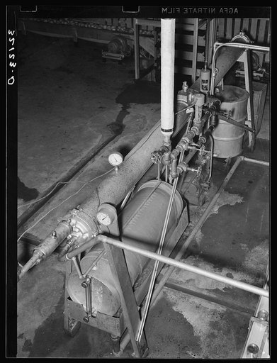 Flash-cooking process used in preparing grapefruit juice for canning. Temperature is carried to 180 degrees, and is attained in a few seconds, thus retaining much of the original flavor. Weslaco, Texas