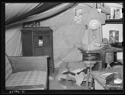 Interior of tent home of white migrant family near Harlingen, Texas. Bed on floor used by two boys (see 32108-D)