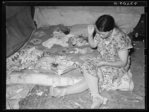 White migrant mother piecing a quilt. Harlingen, Texas. See 32108-D