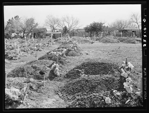 New Mexican graves in cemetery. Raymondville, Texas