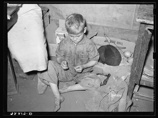 Son of white migrant worker in tent home near Harlingen, Texas