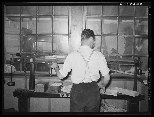 Weighing in truckload of sweet potatoes at starch plant. Laurel, Mississippi