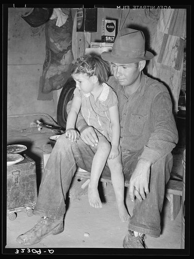 Migrant father and daughter in camp. Edinburg, Texas