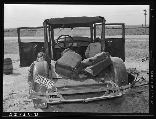 Car of white migrant worker being repaired by owner near Harlingen, Texas
