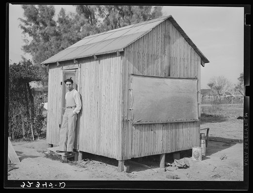 After much persuasion by local physician, this small shed was constructed to house tuberculosis patient. This was the first time in this section that a tuberculosis patient had been isolated from his family. Crystal City, Texas. Mexican settlement