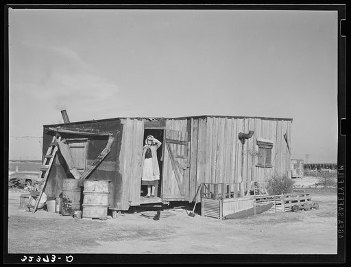 Home of fisherman squatter on shores of Nueces Bay. Corpus Christi, Texas