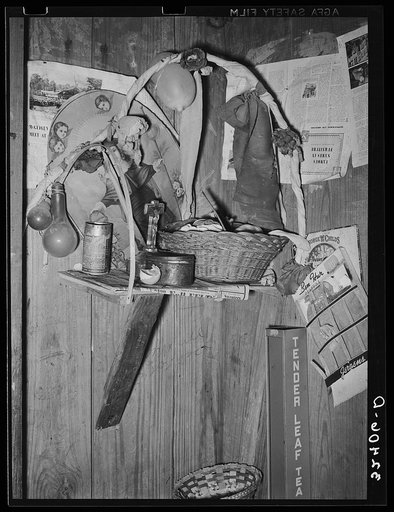 Basket and decorations on shelf of Mexican home. Crystal City, Texas
