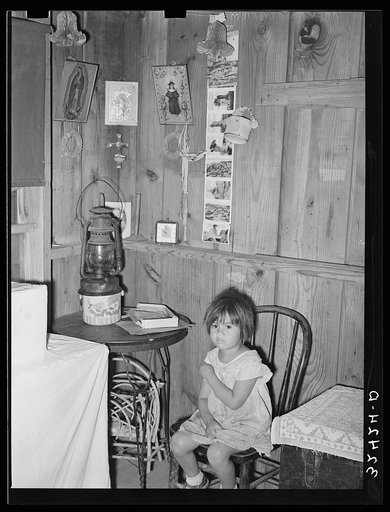 Corner of living room. Mexican house, Crystal City, Texas. Kerosene lamps are used for lighting