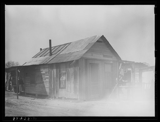Untitled photo, possibly related to: Yard and house of Mexican. San Antonio, Texas