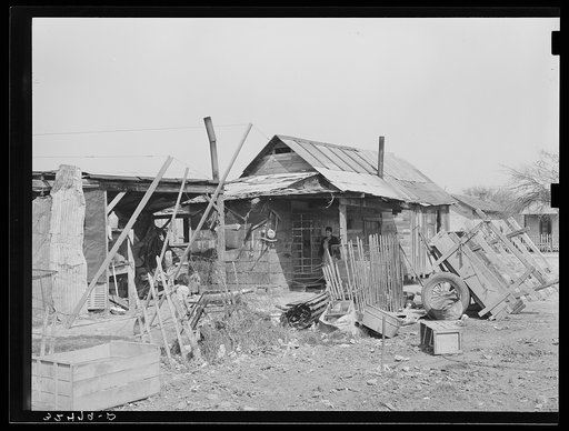 Yard and house of Mexican. San Antonio, Texas