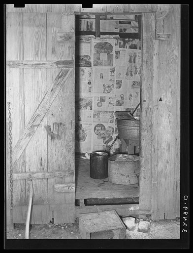 Looking into kitchen of Mexican house built in corral. San Antonio, Texas