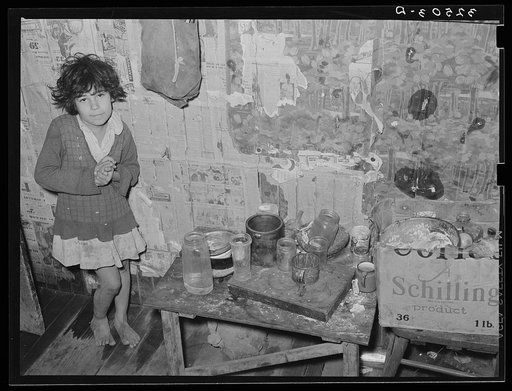 Mexican girl in kitchen. San Antonio, Texas